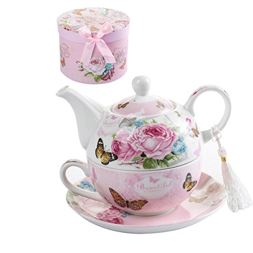 Paarse Thee Uit Een Witte Theepot Wordt in Een Witte Mok Gegoten. Boven Paarse Thee Uit Een Witte Theepot Wordt in Een Witte Mok Gegoten. Boven